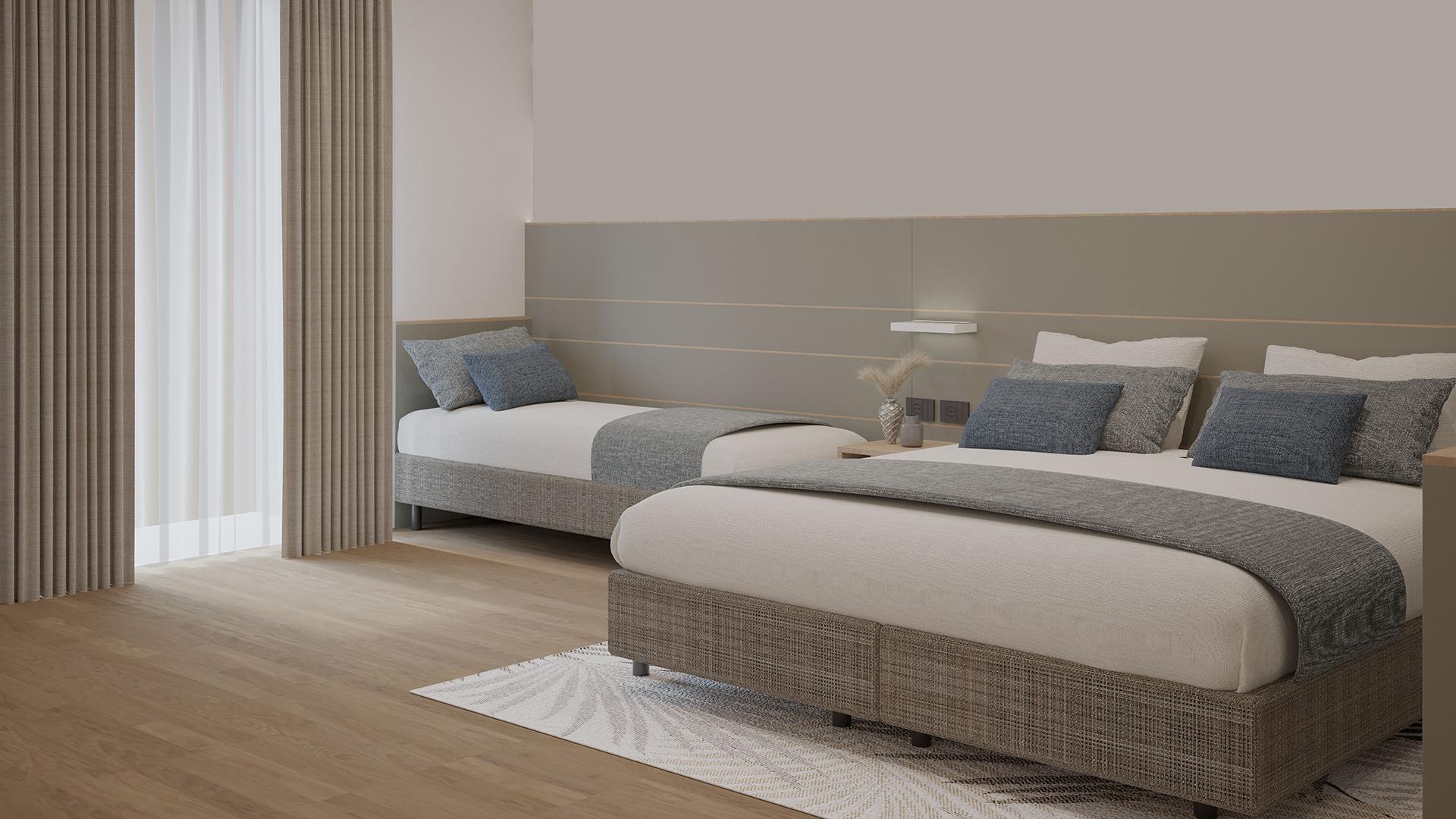 Elegant, cozy room with comfortable beds and soft colors.
