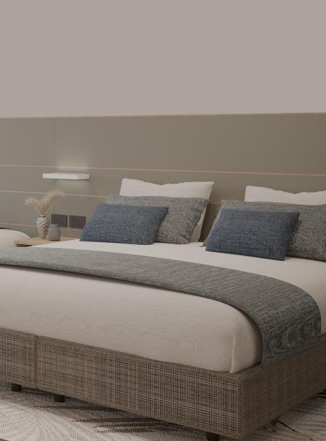 Elegant, cozy room with comfortable beds and soft colors.
